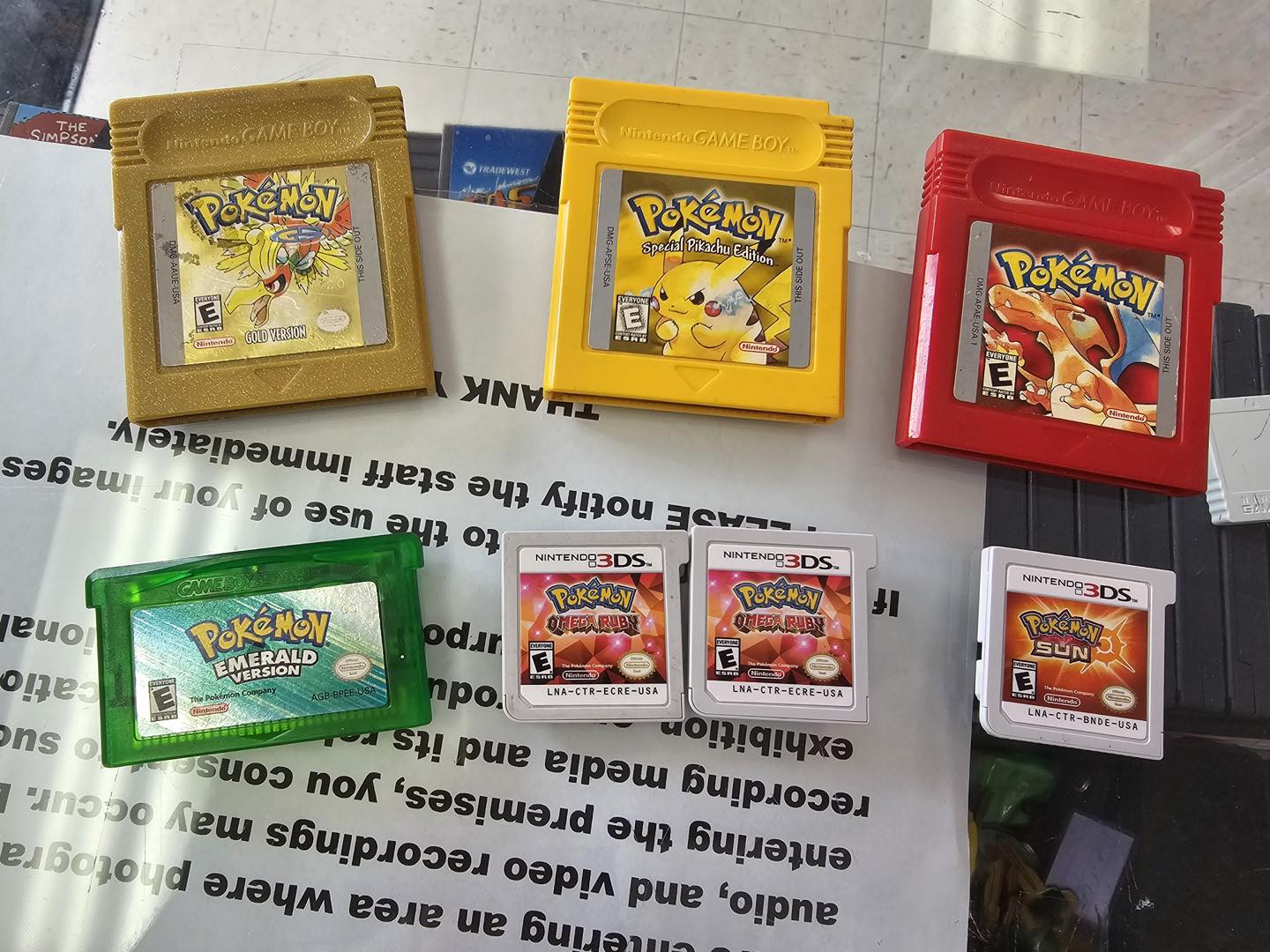 Gameboy Color being traded-in boxed with some other games including a boxed copy of Perfect Dark for N64.