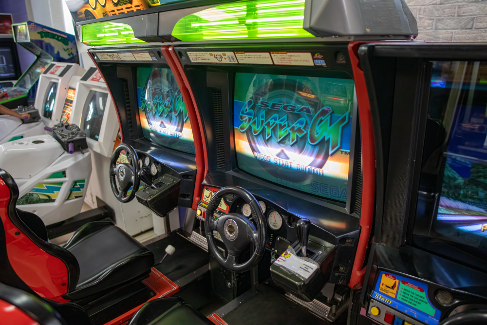 Picture of Sega Super GT arcade cabinets at 6R's entertainment yard